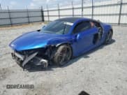 ✅ 2010 Audi R8 5.2L • VIN: WUAANAFG1AN000323 • Lot: 64743294. Listed on Copart with Not provided. Free auction sales archive from the USA and detailed vehicle history report at DreamBid. Image 1.