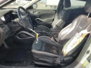 ✅ 2014 Hyundai Veloster Turbo • VIN: KMHTC6AE9EU184531 • Lot: 79663444. Wystawiony na Copart z przebiegiem 81 865 mil. Bezpłatny archiwum sprzedaży aukcyjnych z USA i szczegółowy raport historii pojazdu na DreamBid. Zdjęcie 7.