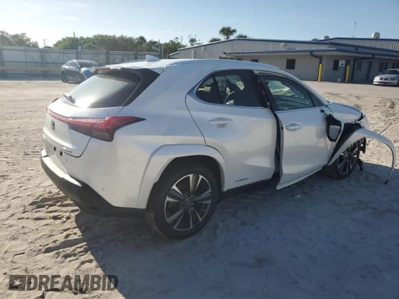 ✅ 2022 Lexus UX 250h • VIN: JTHP9JBH4N2059804 • Lot: 67682675. Listed on Copart with 17,318 mi. Free auction sales archive from the USA and detailed vehicle history report at DreamBid. Image 3.