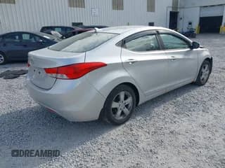 ✅ 2013 Hyundai Elantra GLS • VIN: KMHDH4AE7DU858457 • Lot: 43241444. Listed on IAAI with 153,661 mi. Free auction sales archive from the USA and detailed vehicle history report at DreamBid. Image 4.