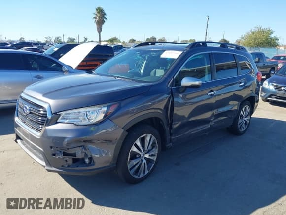 ✅ 2022 Subaru Ascent Touring • VIN: 4S4WMARD1N3404484 • Lot: 43481910. Listed on IAAI with 64,624 mi. Free auction sales archive from the USA and detailed vehicle history report at DreamBid. Image 2.