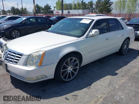 ✅ 2006 Cadillac DTS 1SC • VIN: 1G6KD57Y96U112581 • Лот: 41960024. Опубликован ранее на IAAI с пробегом 105 033 миль. Бесплатный доступ к архиву аукционных продаж из США и подробный отчёт об истории автомобиля на DreamBid. Изображение 2.