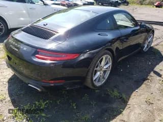 ✅ 2018 Porsche 911 Carrera • VIN: WP0AA2A93JS106166 • Lot: 51105893. Wystawiony na Copart z przebiegiem 11 476 mil. Bezpłatny archiwum sprzedaży aukcyjnych z USA i szczegółowy raport historii pojazdu na DreamBid. Zdjęcie 3.
