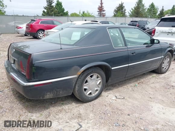✅ 2002 Cadillac Eldorado ESC • VIN: 1G6EL12Y82B105241 • Лот: 42241609. Опубликован ранее на IAAI с пробегом 90 442 миль. Бесплатный доступ к архиву аукционных продаж из США и подробный отчёт об истории автомобиля на DreamBid. Изображение 4.