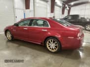 ✅ 2008 Chevrolet Malibu LTZ • VIN: 1G1ZK57728F154812 • Lot: 75428144. Listed on Copart with 197,645 mi. Free auction sales archive from the USA and detailed vehicle history report at DreamBid. Image 2.