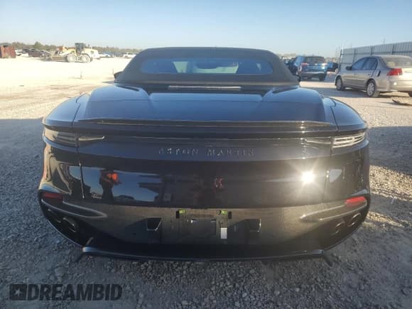 ✅ 2022 Aston Martin DBS • VIN: SCFRMHCV3NGT02917 • Лот: 78601334. Опубликован ранее на Copart с пробегом Не указан. Бесплатный доступ к архиву аукционных продаж из США и подробный отчёт об истории автомобиля на DreamBid. Изображение 6.