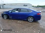 ✅ 2015 Ford Fusion Titanium Hybrid • VIN: 3FA6P0RUXFR126960 • Lot: 42420787. Wystawiony na IAAI z przebiegiem 161 114 mil. Bezpłatny archiwum sprzedaży aukcyjnych z USA i szczegółowy raport historii pojazdu na DreamBid. Zdjęcie 14.