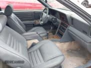 ✅ 1989 Chrysler LeBaron • VIN: 1C3XJ45K7KG108045 • Lot: 42370595. Wystawiony na IAAI z przebiegiem 78 100 mil. Bezpłatny archiwum sprzedaży aukcyjnych z USA i szczegółowy raport historii pojazdu na DreamBid. Zdjęcie 5.