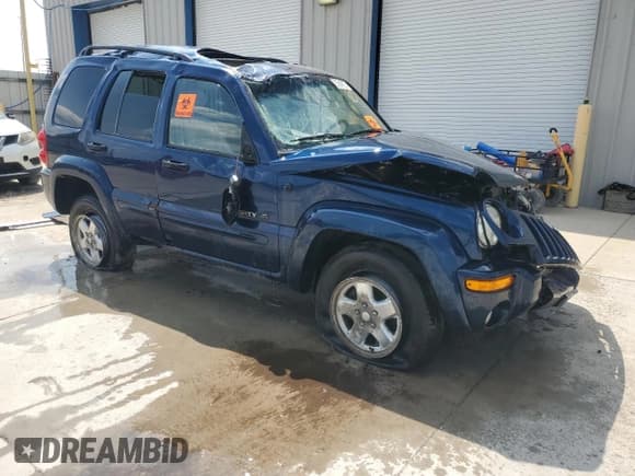 ✅ 2002 Jeep Liberty Limited • VIN: 1J4GL58K22W176485 • Lot: 57940135. Listed on Copart with 141,974 mi. Free auction sales archive from the USA and detailed vehicle history report at DreamBid. Image 4.
