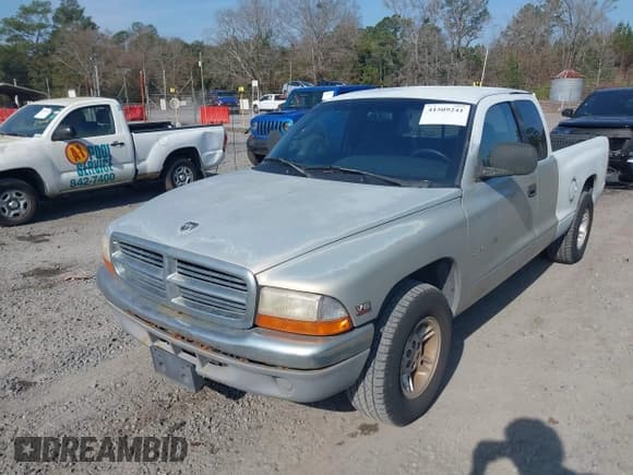 ✅ 2000 Dodge Dakota • VIN: 1B7GL22XXYS577744 • Lot: 41509241. Wystawiony na IAAI z przebiegiem 163 054 mil. Bezpłatny archiwum sprzedaży aukcyjnych z USA i szczegółowy raport historii pojazdu na DreamBid. Zdjęcie 6.