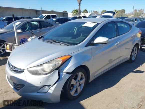 ✅ 2012 Hyundai Elantra GLS • VIN: KMHDH4AE5CU272287 • Lot: 43771253. Listed on IAAI with 164,210 mi. Free auction sales archive from the USA and detailed vehicle history report at DreamBid. Image 2.
