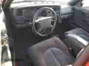 1999 Dodge Dakota SLT z VIN 1B7GL22Y9XS247522, wystawiony jako Copart lot #86311215 z przebiegiem 63 002 mil mil oraz Czysty tytuł • Clean title. Historia ofert i sprzedaży dostępna na DreamBid. Obrazek 8.