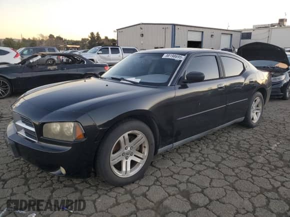 2007 Dodge Charger with VIN 2B3KA43G77H780494, listed as a Copart auction lot 88198695 with 237,482 mi miles and Salvage title. Bid and sale history available at DreamBid. Image 1.