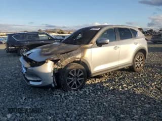 ✅ 2018 Mazda CX-5 Touring • VIN: JM3KFACM4J0337906 • Lot: 92728685. Wystawiony na Copart z przebiegiem Nie podano. Bezpłatny archiwum sprzedaży aukcyjnych z USA i szczegółowy raport historii pojazdu na DreamBid. Zdjęcie 1.