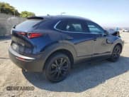 ✅ 2023 Mazda CX-30 Premium • VIN: 3MVDMBDY2PM551196 • Lot: 63128945. Listed on Copart with 28,893 mi. Free auction sales archive from the USA and detailed vehicle history report at DreamBid. Image 3.