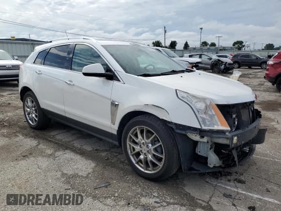 ✅ 2013 Cadillac SRX Performance Collection • VIN: 3GYFNHE36DS521908 • Lot: 65402415. Listed on Copart with 124,799 mi. Free auction sales archive from the USA and detailed vehicle history report at DreamBid. Image 4.