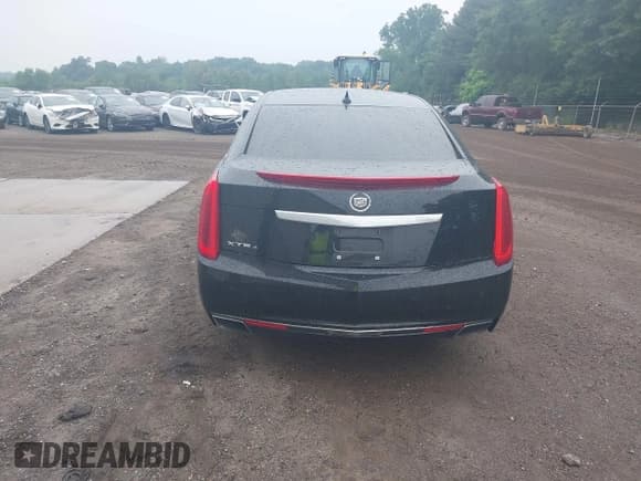✅ 2014 Cadillac XTS Luxury • VIN: 2G61N5S34E9287594 • Lot: 42380672. Listed on IAAI with 109,783 mi. Free auction sales archive from the USA and detailed vehicle history report at DreamBid. Image 17.