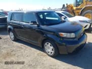 ✅ 2009 Scion xB • VIN: JTLKE50E591063366 • Lot: 43809513. Listed on IAAI with 165,587 mi. Free auction sales archive from the USA and detailed vehicle history report at DreamBid. Image 1.