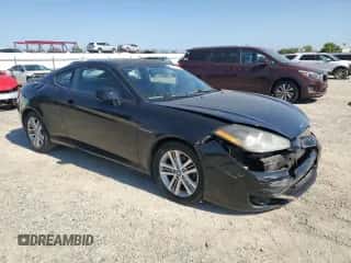2008 Hyundai Tiburon GS с VIN KMHHM66DX8U265397, выставлен на аукционе Copart как лот 65239165 с пробегом 163 072 миль миль и Списание • Salvage title. История ставок и продаж доступна на DreamBid. Изображение 4.