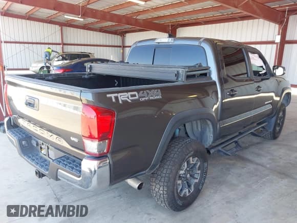 ✅ 2017 Toyota Tacoma SR5 • VIN: 3TMCZ5AN9HM062936 • Lot: 42236311. Listed on IAAI with 60,479 mi. Free auction sales archive from the USA and detailed vehicle history report at DreamBid. Image 4.