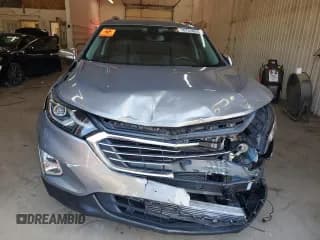 ✅ 2018 Chevrolet Equinox Premier • VIN: 3GNAXVEV3JS627987 • Lot: 70763055. Wystawiony na Copart z przebiegiem 65 879 mil. Bezpłatny archiwum sprzedaży aukcyjnych z USA i szczegółowy raport historii pojazdu na DreamBid. Zdjęcie 5.