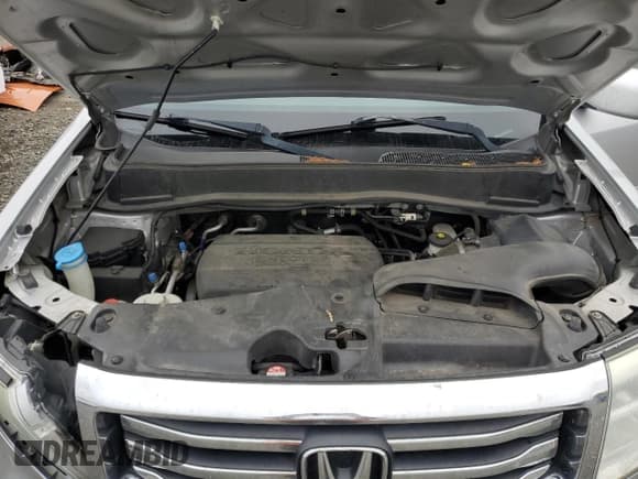 ✅ 2012 Honda Pilot Touring • VIN: 5FNYF4H95CB031701 • Лот: 90135545. Опубликован ранее на Copart с пробегом 162 979 миль. Бесплатный доступ к архиву аукционных продаж из США и подробный отчёт об истории автомобиля на DreamBid. Изображение 12.