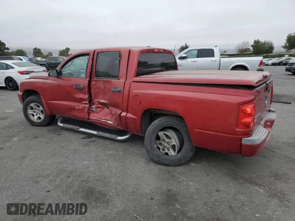 2007 Dodge Dakota SLT с VIN 1D7HE48K07S173426, выставлен на аукционе Copart как лот 71843254 с пробегом 205 125 миль миль и Списание • Salvage title. История ставок и продаж доступна на DreamBid. Изображение 2.
