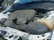 ✅ 2015 Chrysler 300 C • VIN: 2C3CCAEG2FH772766 • Lot: 43008049. Listed on IAAI with 127,261 mi. Free auction sales archive from the USA and detailed vehicle history report at DreamBid. Image 20.