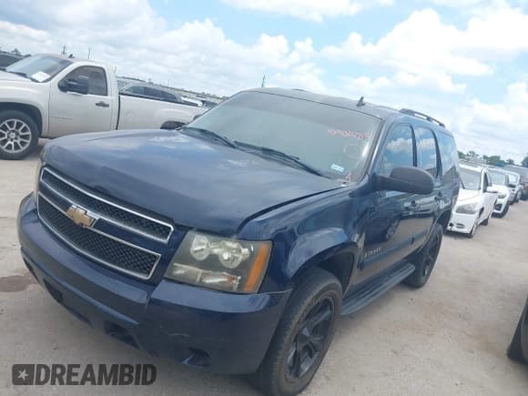 ✅ 2007 Chevrolet Tahoe LS • VIN: 1GNFC13C77J403319 • Lot: 42900785. Listed on IAAI with 229,581 mi. Free auction sales archive from the USA and detailed vehicle history report at DreamBid. Image 2.
