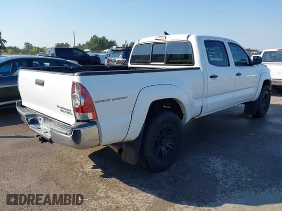 ✅ 2015 Toyota Tacoma PreRunner • VIN: 5TFKU4HN6FX006874 • Lot: 43090148. Listed on IAAI with 182,527 mi. Free auction sales archive from the USA and detailed vehicle history report at DreamBid. Image 4.
