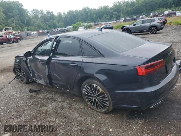 ✅ 2017 Audi A6 Prestige • VIN: WAUH2AFC9HN011658 • Лот: 59338435. Опубликован ранее на Copart с пробегом 162 697 миль. Бесплатный доступ к архиву аукционных продаж из США и подробный отчёт об истории автомобиля на DreamBid. Изображение 2.