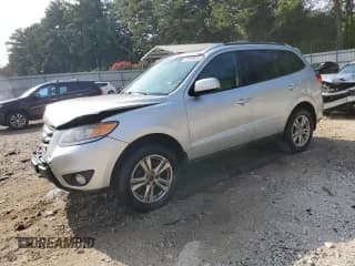 ✅ 2012 Hyundai Santa Fe SE • VIN: 5XYZH4AG6CG161017 • Lot: 71800835. Listed on Copart with 198,341 mi. Free auction sales archive from the USA and detailed vehicle history report at DreamBid. Image 1.