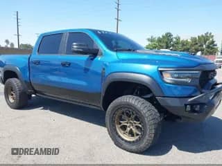 2024 Ram 1500 TRX с VIN 1C6SRFU95RN230215, выставлен на аукционе IAAI как лот 43197408 с пробегом 8 034 миль миль и . История ставок и продаж доступна на DreamBid. Изображение 1.