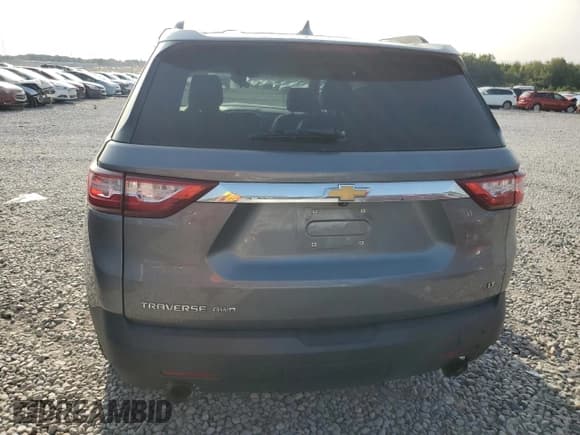 ✅ 2021 Chevrolet Traverse LT • VIN: 1GNEVHKW0MJ209981 • Lot: 70759544. Wystawiony na Copart z przebiegiem 98 551 mil. Bezpłatny archiwum sprzedaży aukcyjnych z USA i szczegółowy raport historii pojazdu na DreamBid. Zdjęcie 6.