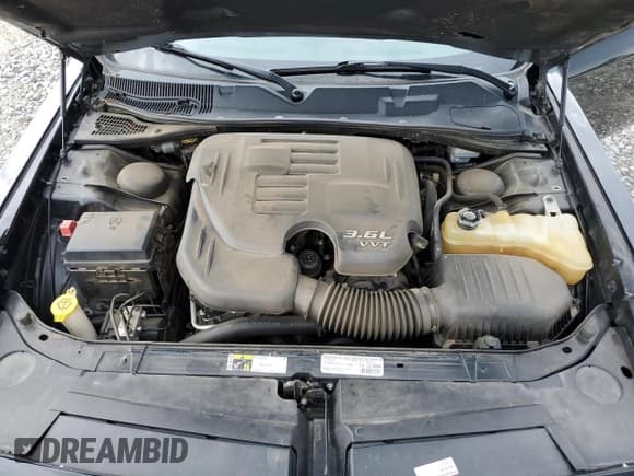 ✅ 2014 Dodge Challenger SXT • VIN: 2C3CDYAGXEH285924 • Lot: 63399984. Wystawiony na Copart z przebiegiem 118 792 mil. Bezpłatny archiwum sprzedaży aukcyjnych z USA i szczegółowy raport historii pojazdu na DreamBid. Zdjęcie 11.