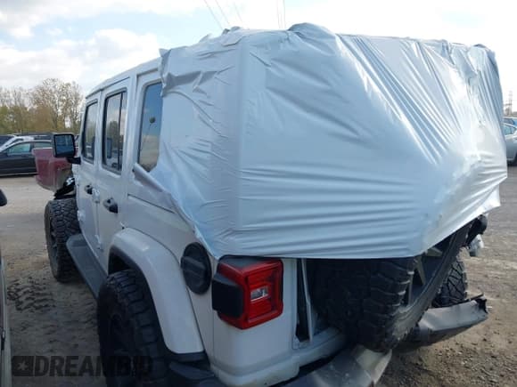 ✅ 2021 Jeep Wrangler Unlimited Sahara • VIN: 1C4HJXEG3MW782859 • Lot: 43320520. Listed on IAAI with 75,169 mi. Free auction sales archive from the USA and detailed vehicle history report at DreamBid. Image 18.