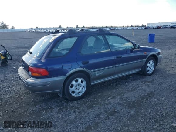 ✅ 1997 Subaru Impreza Outback Special Sports • VIN: JF1GF4858VH810334 • Lot: 82258935. Listed on Copart with 128,224 mi. Free auction sales archive from the USA and detailed vehicle history report at DreamBid. Image 3.