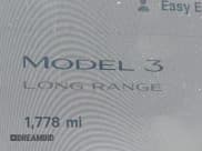 ✅ 2025 Tesla Model 3 Long Range • VIN: 5YJ3E1EA0SF041609 • Lot: 43185770. Wystawiony na IAAI z przebiegiem 1 778 mil. Bezpłatny archiwum sprzedaży aukcyjnych z USA i szczegółowy raport historii pojazdu na DreamBid. Zdjęcie 14.
