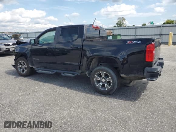 ✅ 2015 Chevrolet Colorado 4WD Z71 • VIN: 1GCGTCE34F1188311 • Лот: 72218454. Опубликован ранее на Copart с пробегом 111 144 миль. Бесплатный доступ к архиву аукционных продаж из США и подробный отчёт об истории автомобиля на DreamBid. Изображение 2.