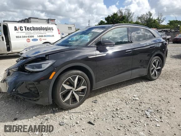 ✅ 2023 Volkswagen ID.4 S • VIN: 1V25MPE85PC050451 • Лот: 85138155. Опубликован ранее на Copart с пробегом 19 729 миль. Бесплатный доступ к архиву аукционных продаж из США и подробный отчёт об истории автомобиля на DreamBid. Изображение 1.