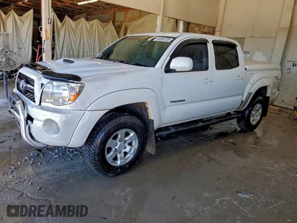 ✅ 2011 Toyota Tacoma PreRunner • VIN: 3TMJU4GN8BM113695 • Lot: 94365735. Listed on Copart with 249,473 mi. Free auction sales archive from the USA and detailed vehicle history report at DreamBid. Image 1.