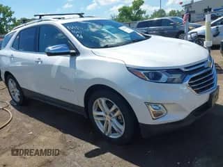 2018 Chevrolet Equinox Premier z VIN 2GNAXNEX0J6149351, wystawiony jako IAAI lot #42370286 z przebiegiem 60 103 mil mil oraz . Historia ofert i sprzedaży dostępna na DreamBid. Obrazek 1.