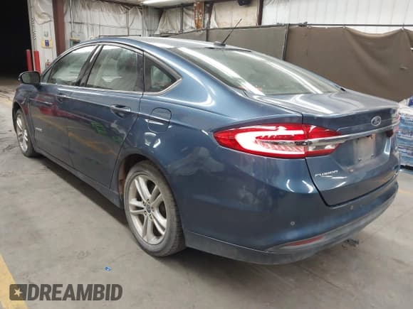 ✅ 2018 Ford Fusion SE • VIN: 3FA6P0LU8JR271089 • Lot: 43197021. Listed on IAAI with 166,130 mi. Free auction sales archive from the USA and detailed vehicle history report at DreamBid. Image 3.