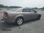 ✅ 2012 Chevrolet Malibu 1LS • VIN: 1G1ZB5E05CF316317 • Lot: 59702495. Listed on Copart with 137,824 mi. Free auction sales archive from the USA and detailed vehicle history report at DreamBid. Image 3.