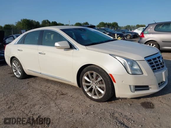 ✅ 2014 Cadillac XTS Luxury • VIN: 2G61M5S38E9131433 • Lot: 43151702. Listed on IAAI with 177,051 mi. Free auction sales archive from the USA and detailed vehicle history report at DreamBid. Image 1.