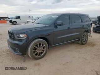 2016 Dodge Durango Limited with VIN 1C4RDJDG1GC430427, listed as a Copart auction lot 71283905 with 124,376 mi miles and Salvage title. Bid and sale history available at DreamBid. Image 1.