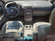 ✅ 2006 Buick Terraza CXL • VIN: 5GADV33L16D125781 • Лот: 71513055. Опубликован ранее на Copart с пробегом 122 465 миль. Бесплатный доступ к архиву аукционных продаж из США и подробный отчёт об истории автомобиля на DreamBid. Изображение 8.