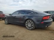 ✅ 2014 Audi A7 Premium Plus • VIN: WAUWGAFCXEN018266 • Лот: 69325185. Опубликован ранее на Copart с пробегом 200 046 миль. Бесплатный доступ к архиву аукционных продаж из США и подробный отчёт об истории автомобиля на DreamBid. Изображение 2.