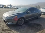 ✅ 2017 Ford Fusion Hybrid Titanium • VIN: 3FA6P0RU2HR105460 • Lot: 89561255. Listed on Copart with 168,577 mi. Free auction sales archive from the USA and detailed vehicle history report at DreamBid. Image 1.