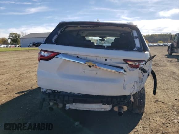 ✅ 2021 Chevrolet Traverse LS • VIN: 1GNEVFKW9MJ102108 • Lot: 90322385. Wystawiony na Copart z przebiegiem 63 602 mil. Bezpłatny archiwum sprzedaży aukcyjnych z USA i szczegółowy raport historii pojazdu na DreamBid. Zdjęcie 6.